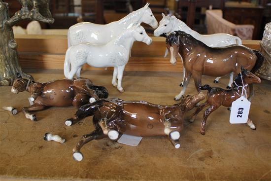 Six Beswick horses and a foal, various (four gloss brown, three grey)